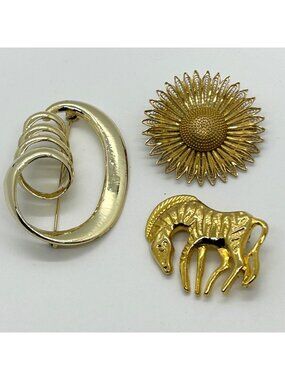 Vintage Gold Tone Brooch Lot Zebra  Sunflower and a Modernist Coiled Pin